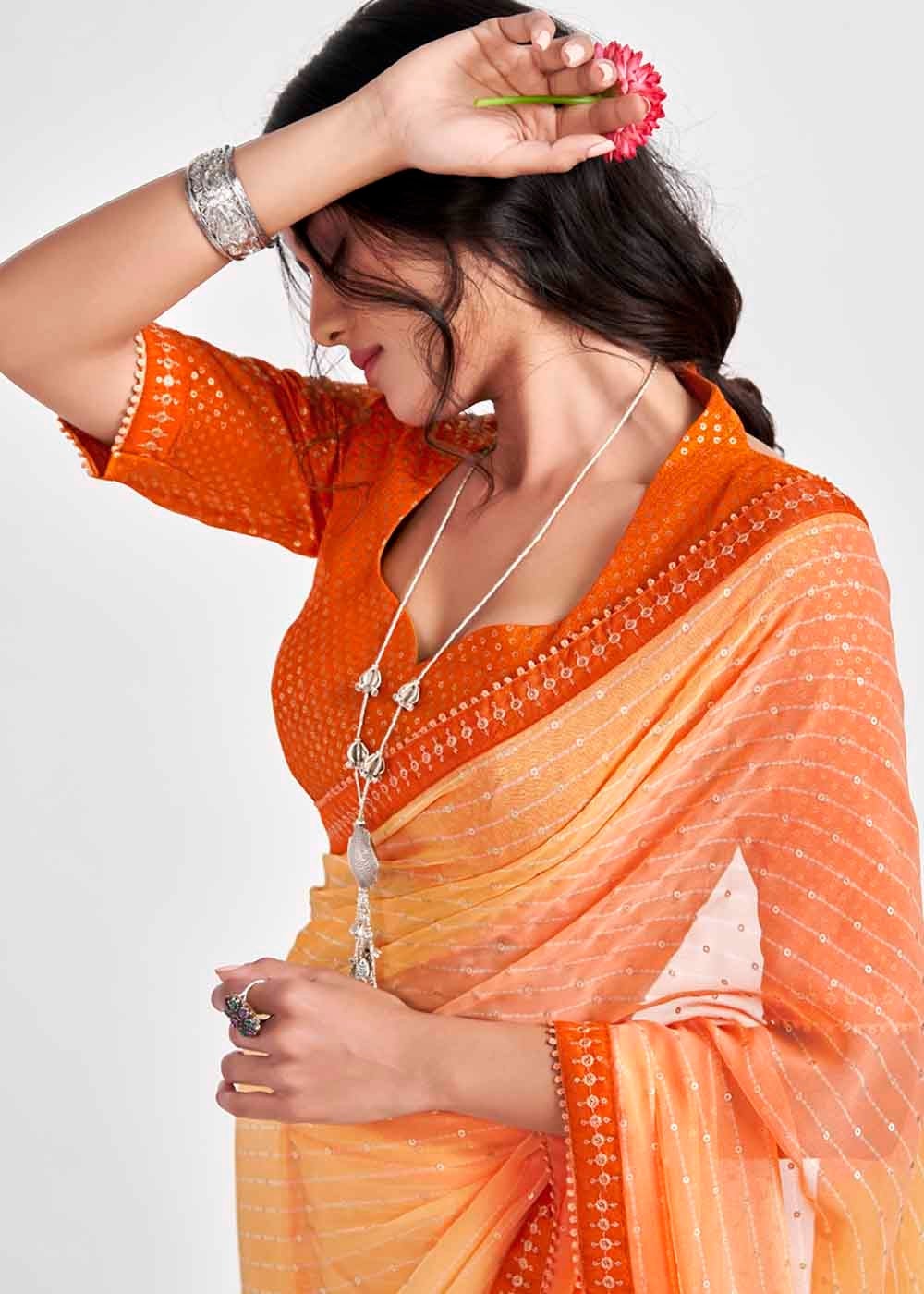 Apricot Orange Printed Georgette Saree