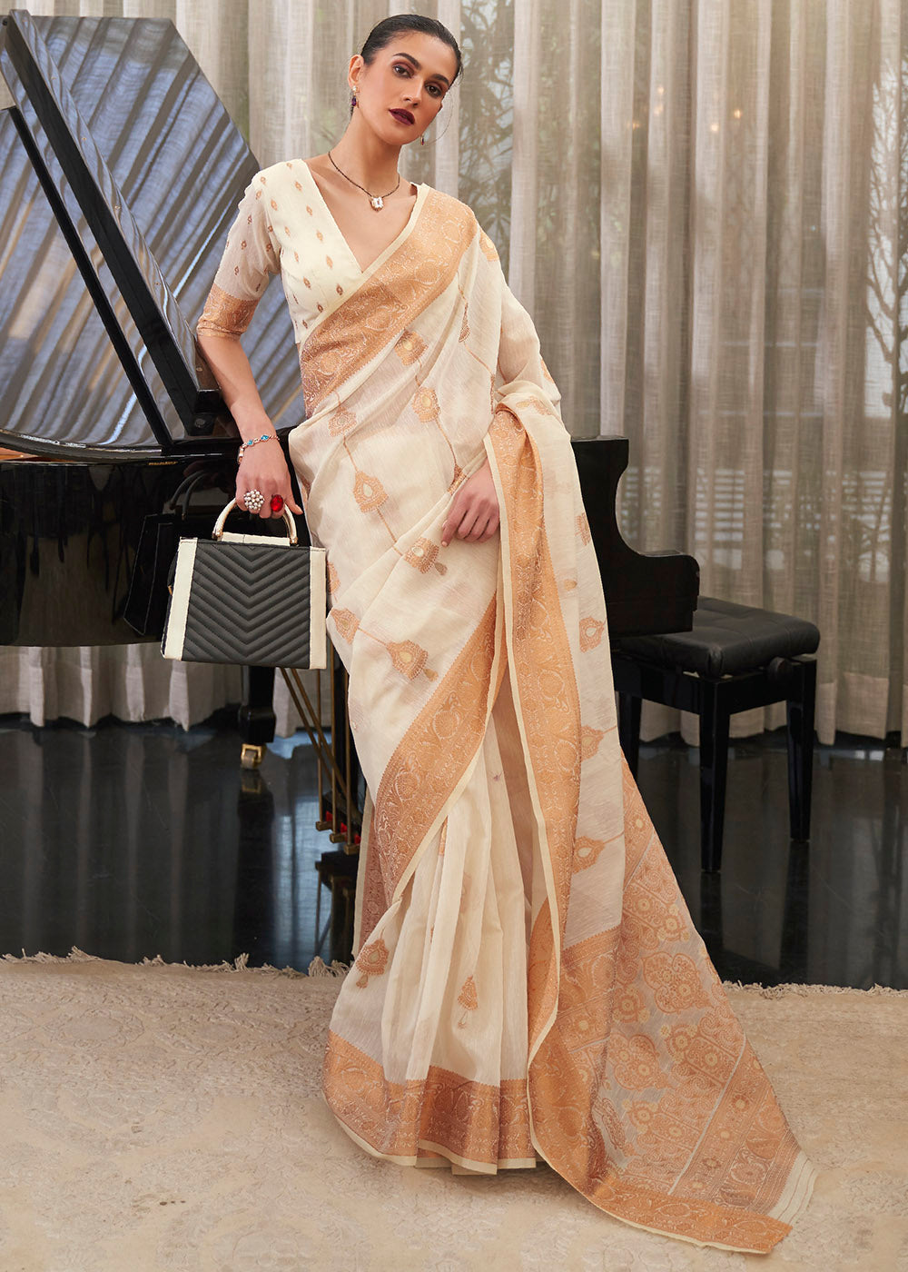 Apricot White Zari Woven Linen Saree