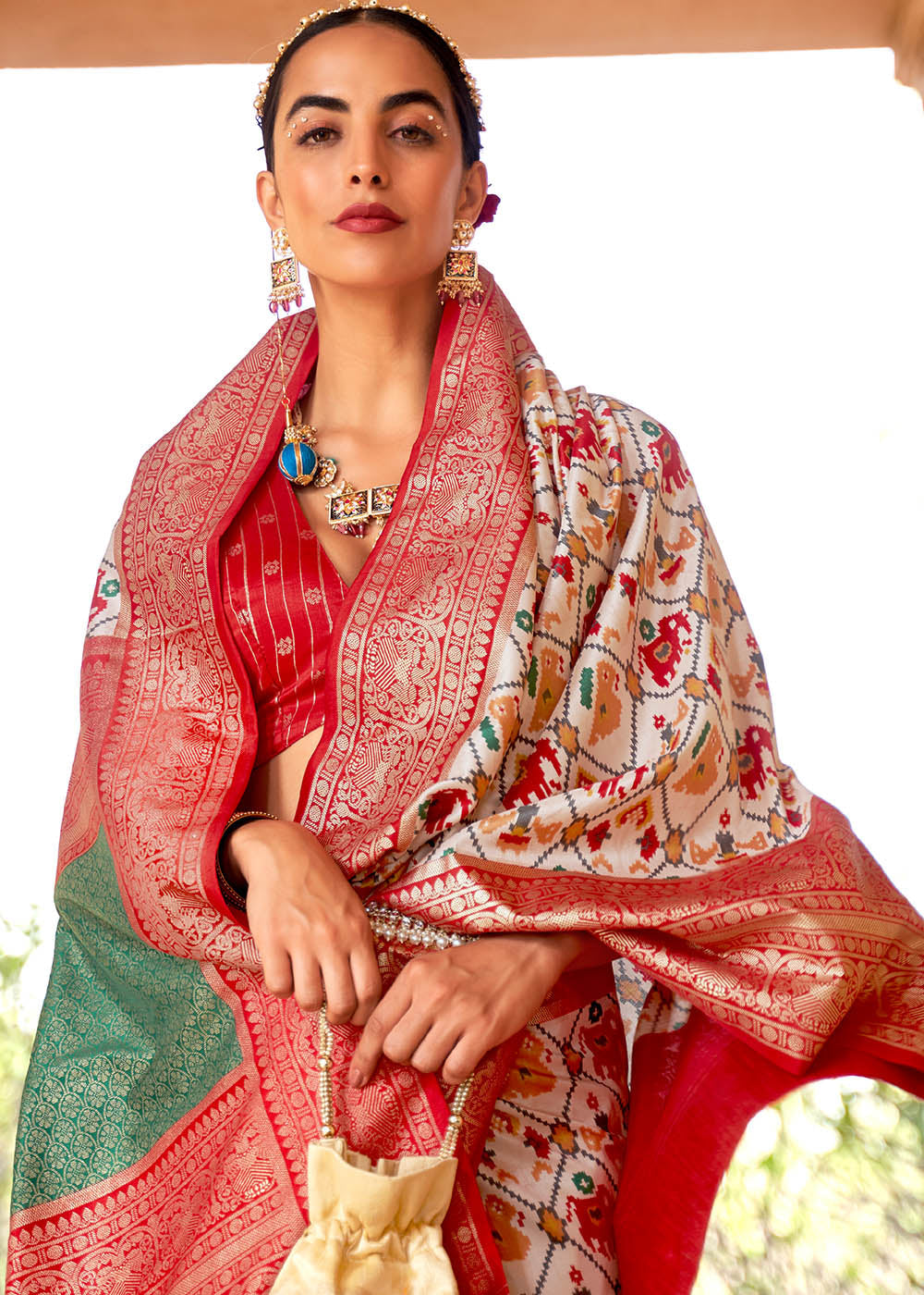 Swiss Coffee White and Red Printed Patola Saree