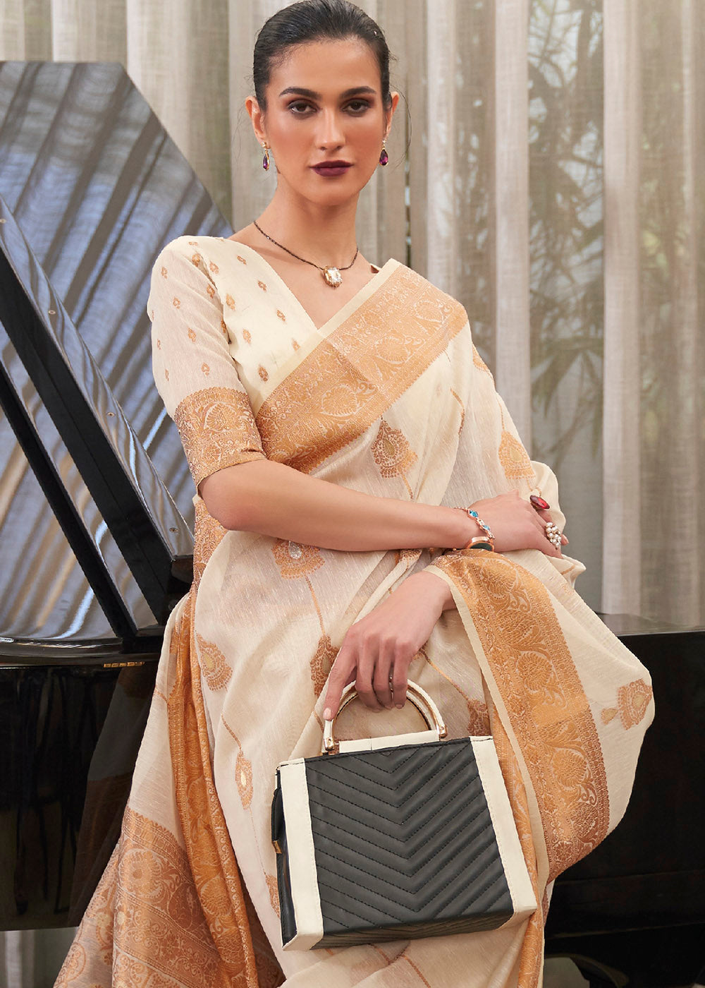 Apricot White Zari Woven Linen Saree