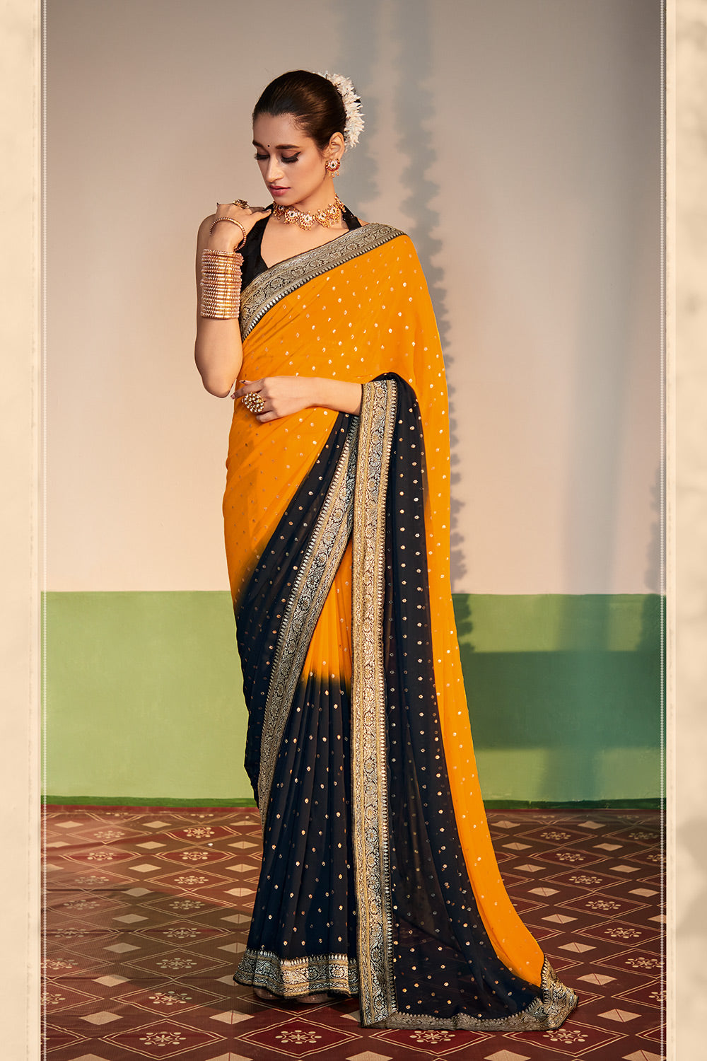 Tangerine Yellow and Black Printed Georgette Saree