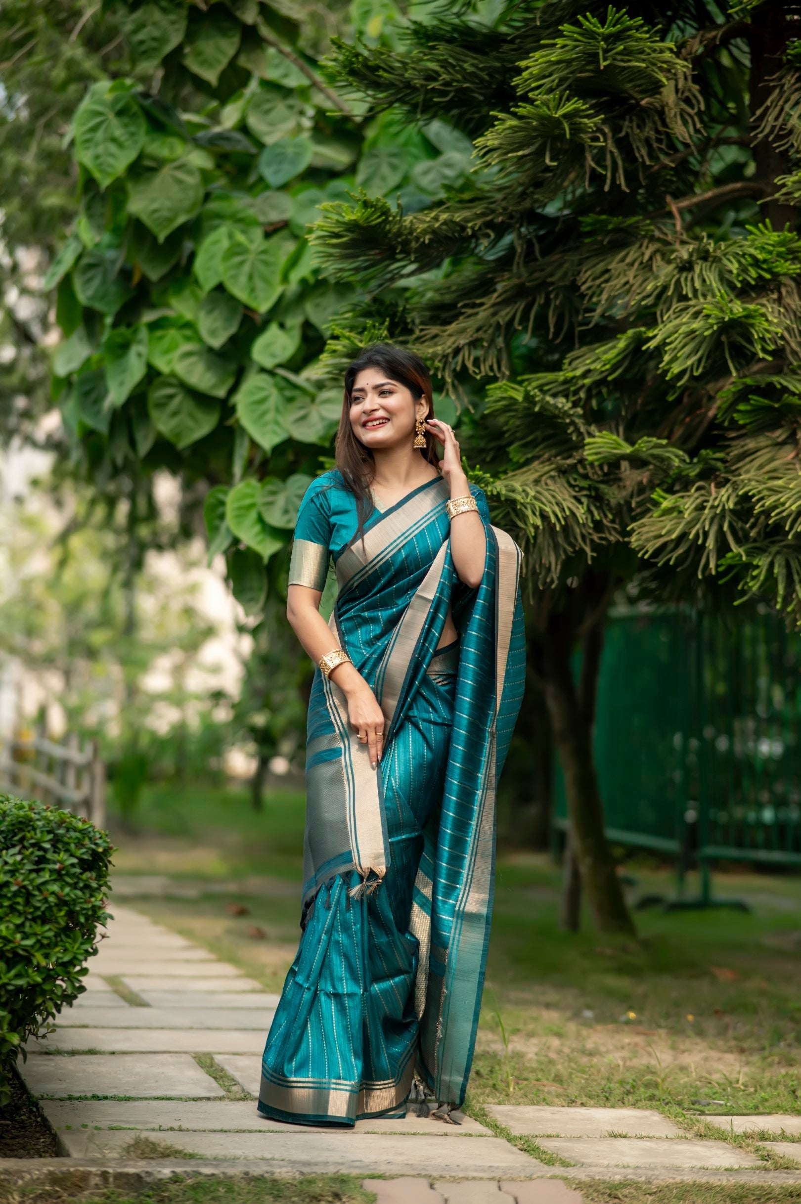 Teal Blue Woven Raw Silk Saree