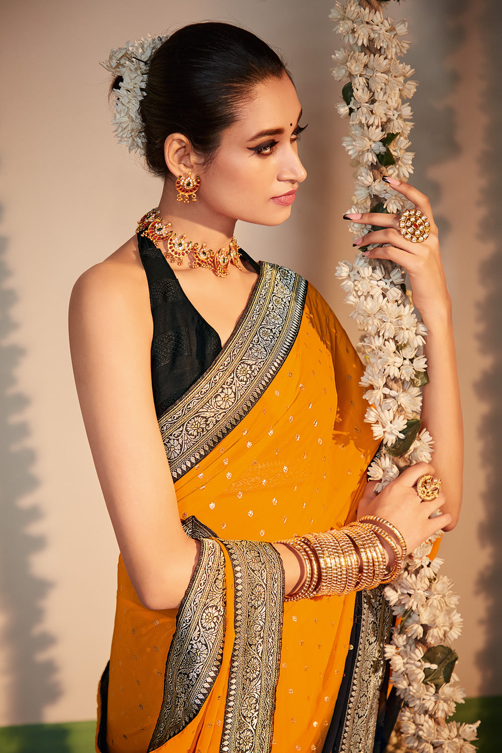 Tangerine Yellow and Black Printed Georgette Saree