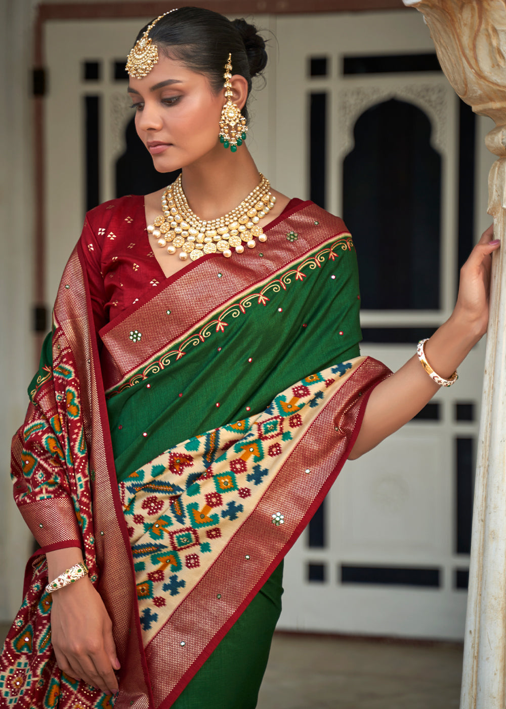 Jewel Green and Red Woven Patola Silk Saree