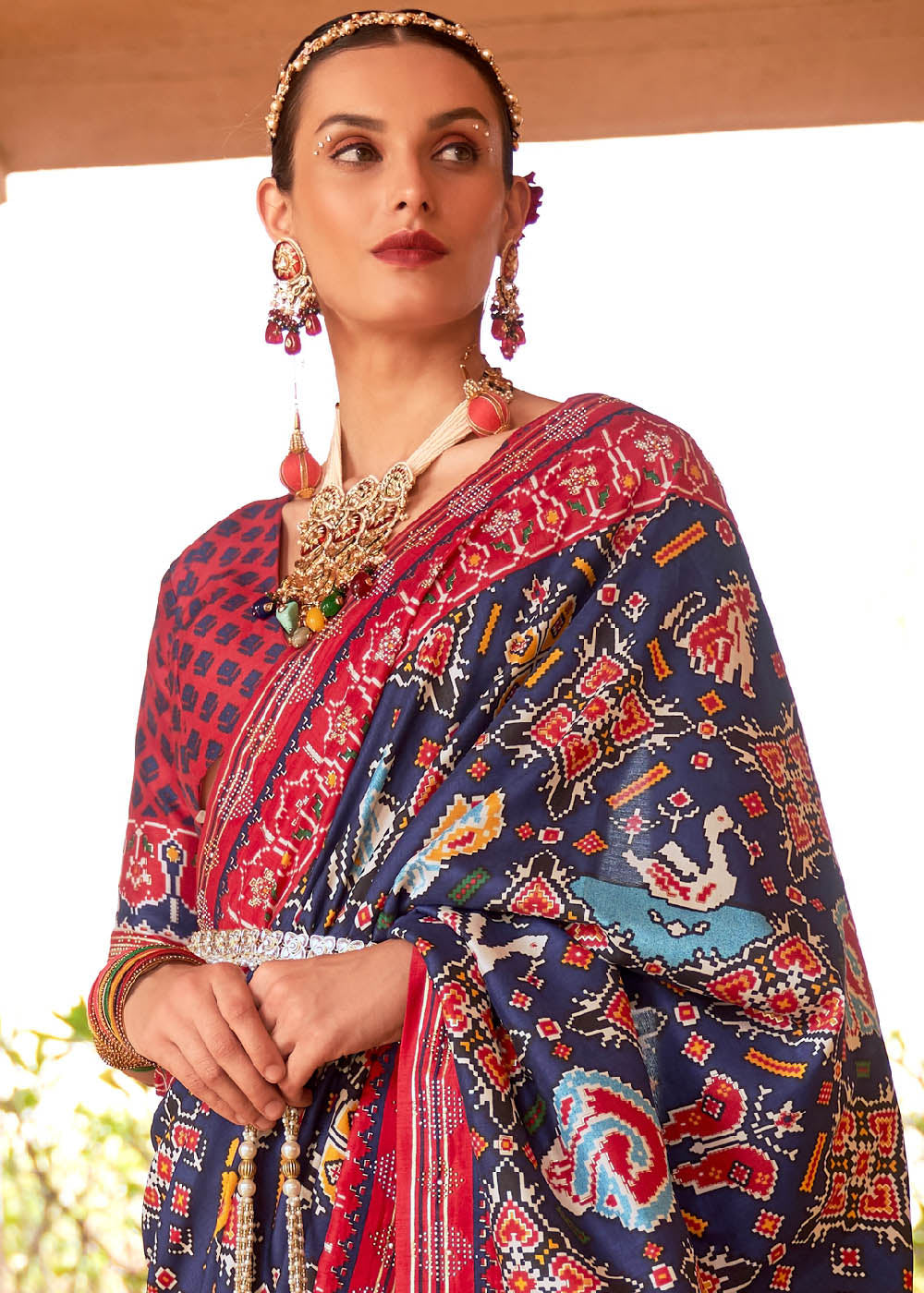 Mulled Wine Blue and Red Printed Patola Saree