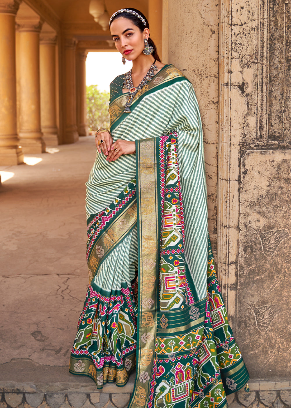 Casal White and Green Zari Woven Patola Saree