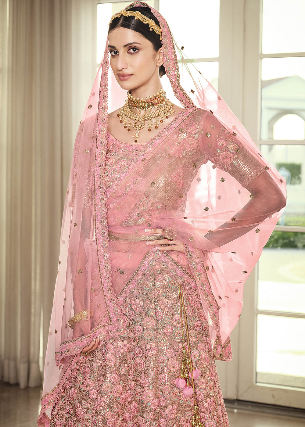 Sundown Pink Net Designer Lehenga With Heavy Embroidered Work