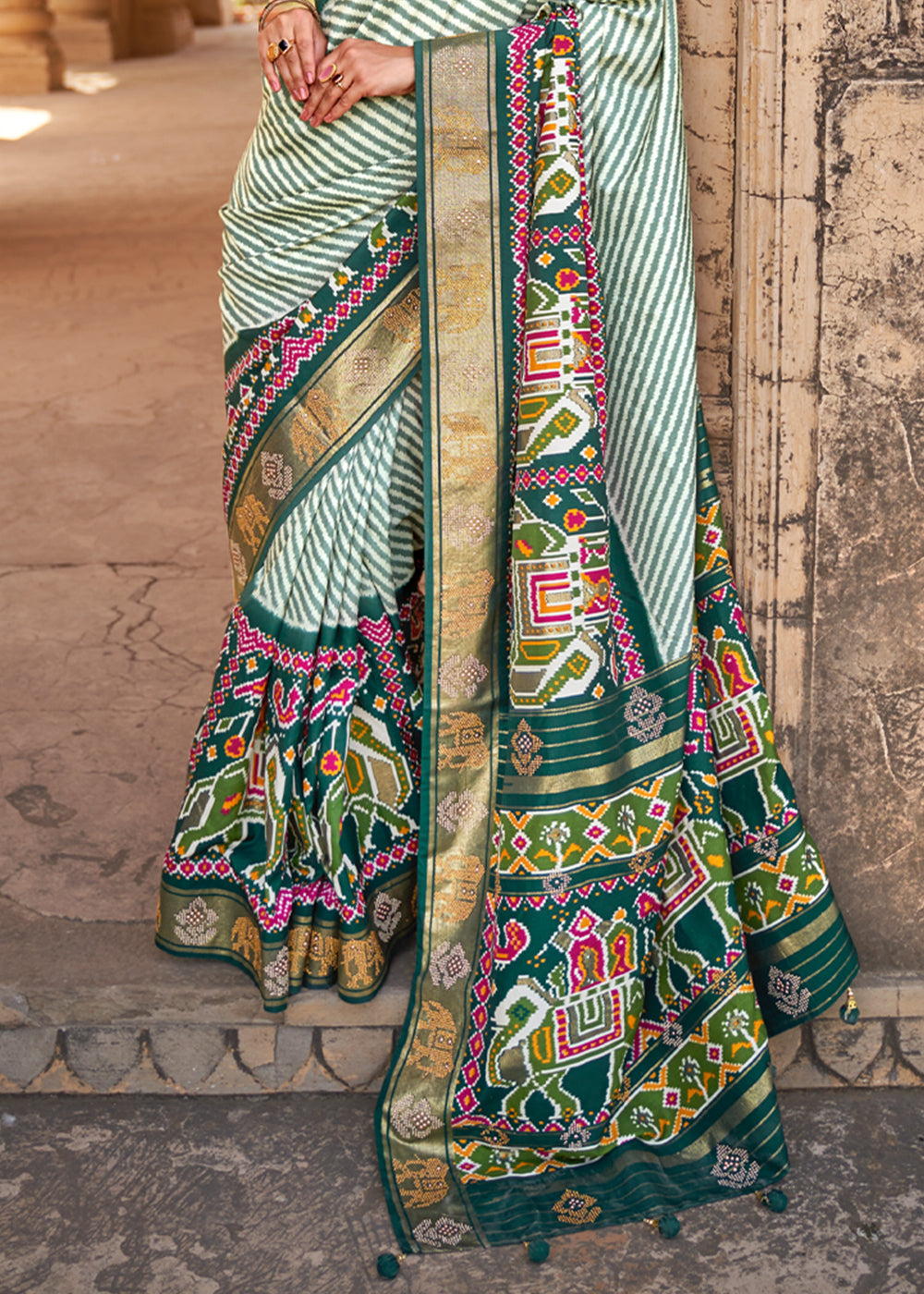 Casal White and Green Zari Woven Patola Saree