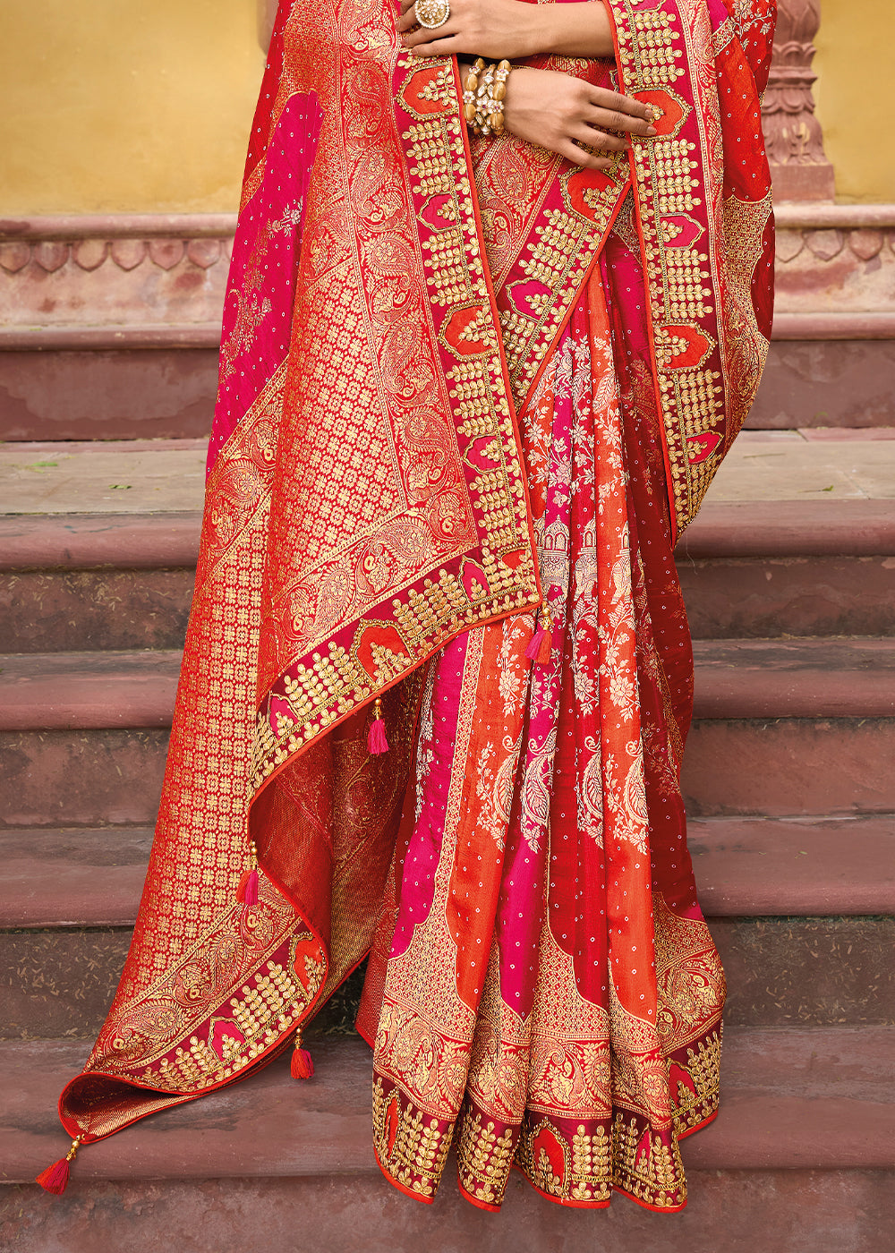 Cinnabar Orange and Red Embroidered Dola Silk Saree