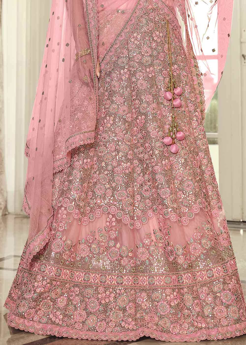 Sundown Pink Net Designer Lehenga With Heavy Embroidered Work