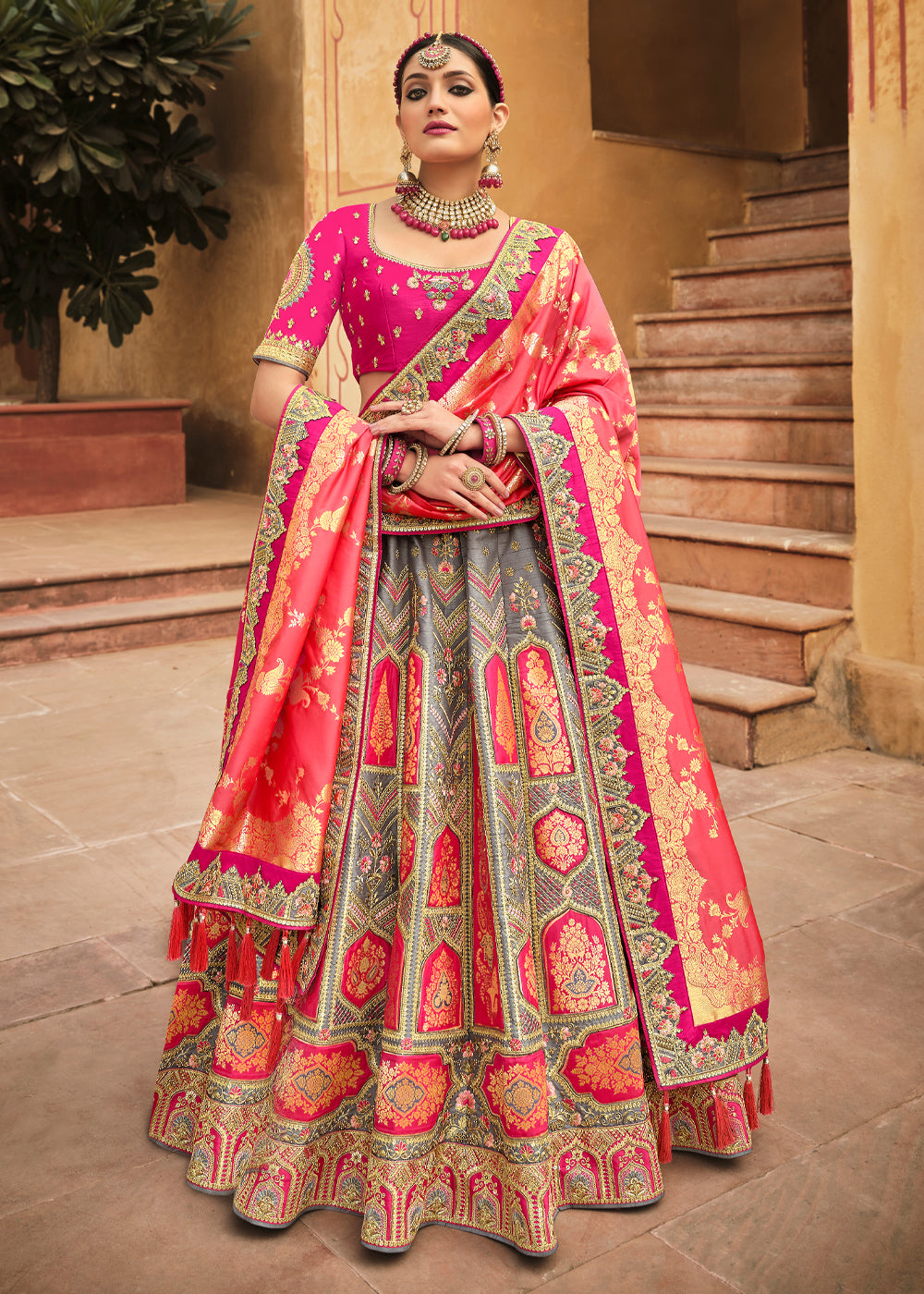 Salmon Pink and Grey Heavy Embroidered Lehenga