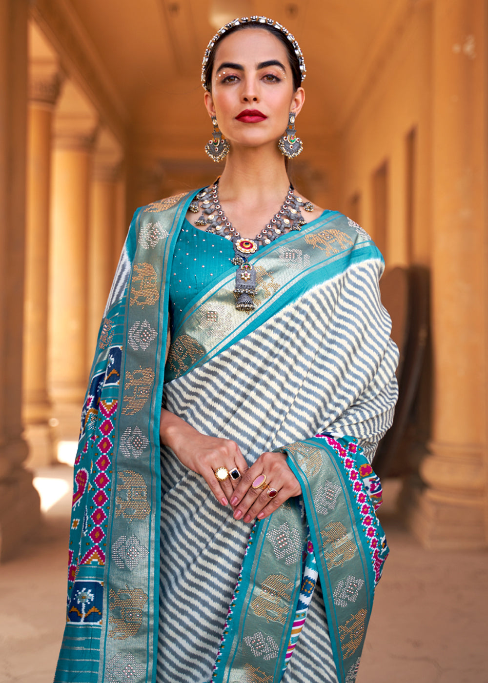 Boston White and Blue Zari Woven Patola Saree