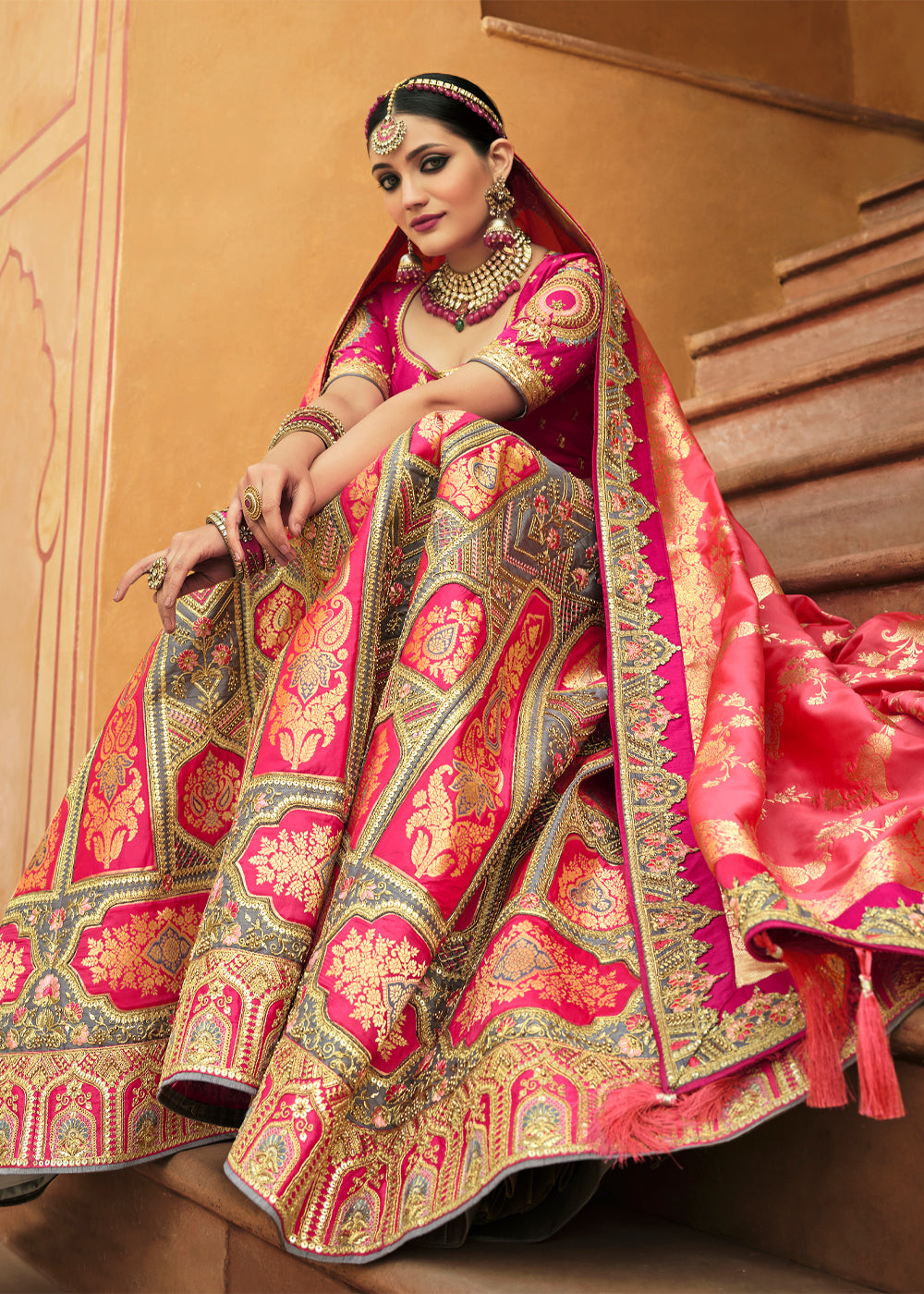 Salmon Pink and Grey Heavy Embroidered Lehenga