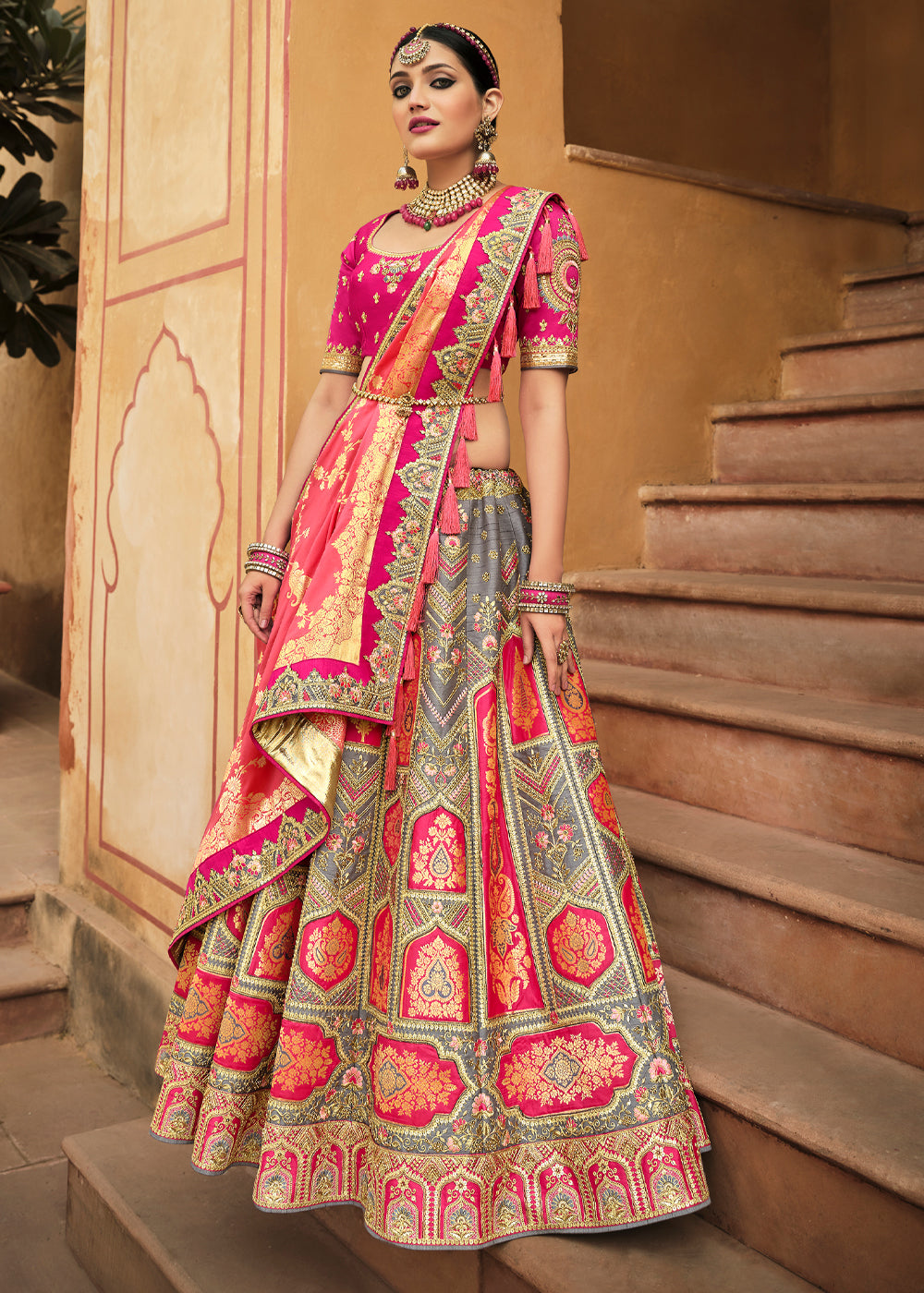 Salmon Pink and Grey Heavy Embroidered Lehenga