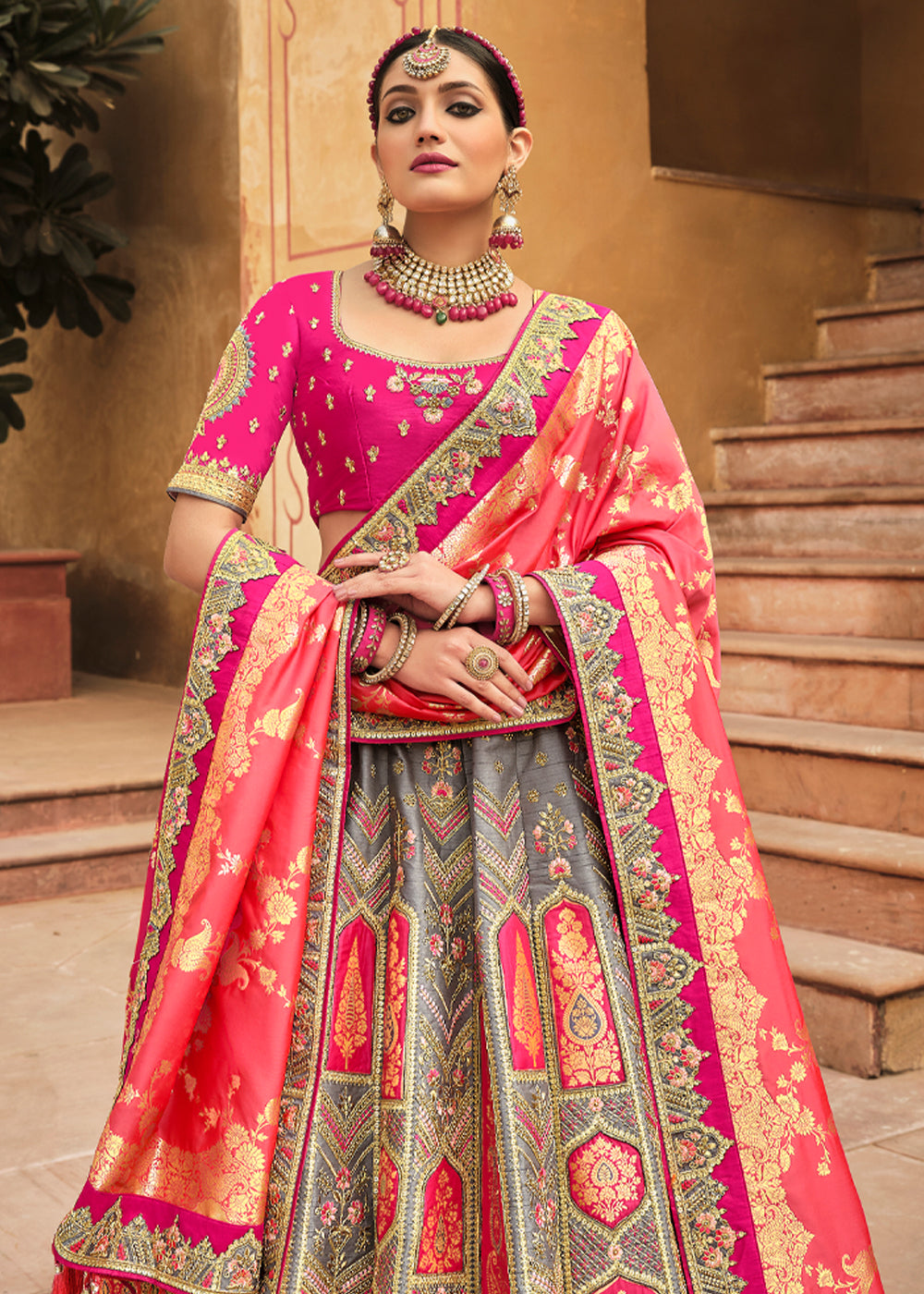 Salmon Pink and Grey Heavy Embroidered Lehenga