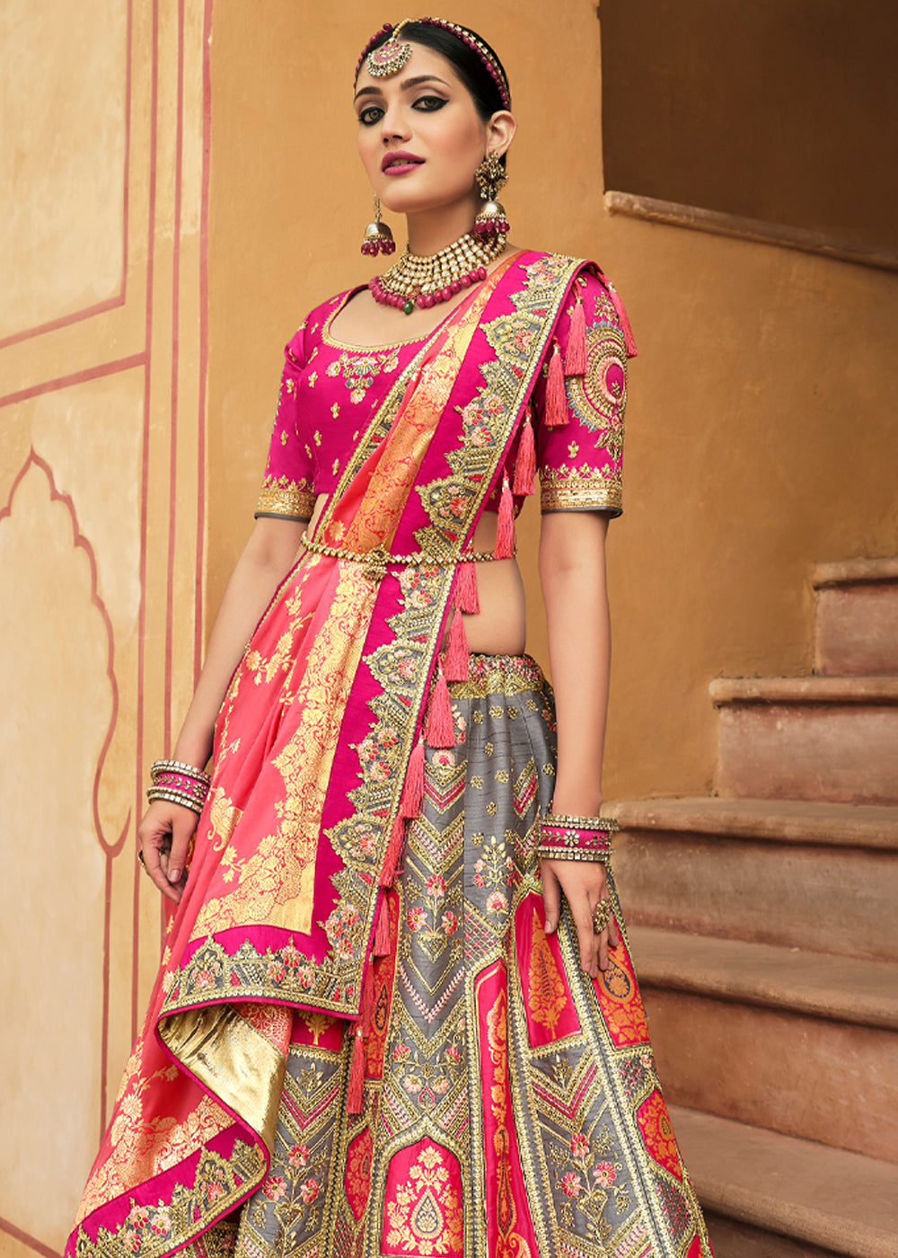 Salmon Pink and Grey Heavy Embroidered Lehenga