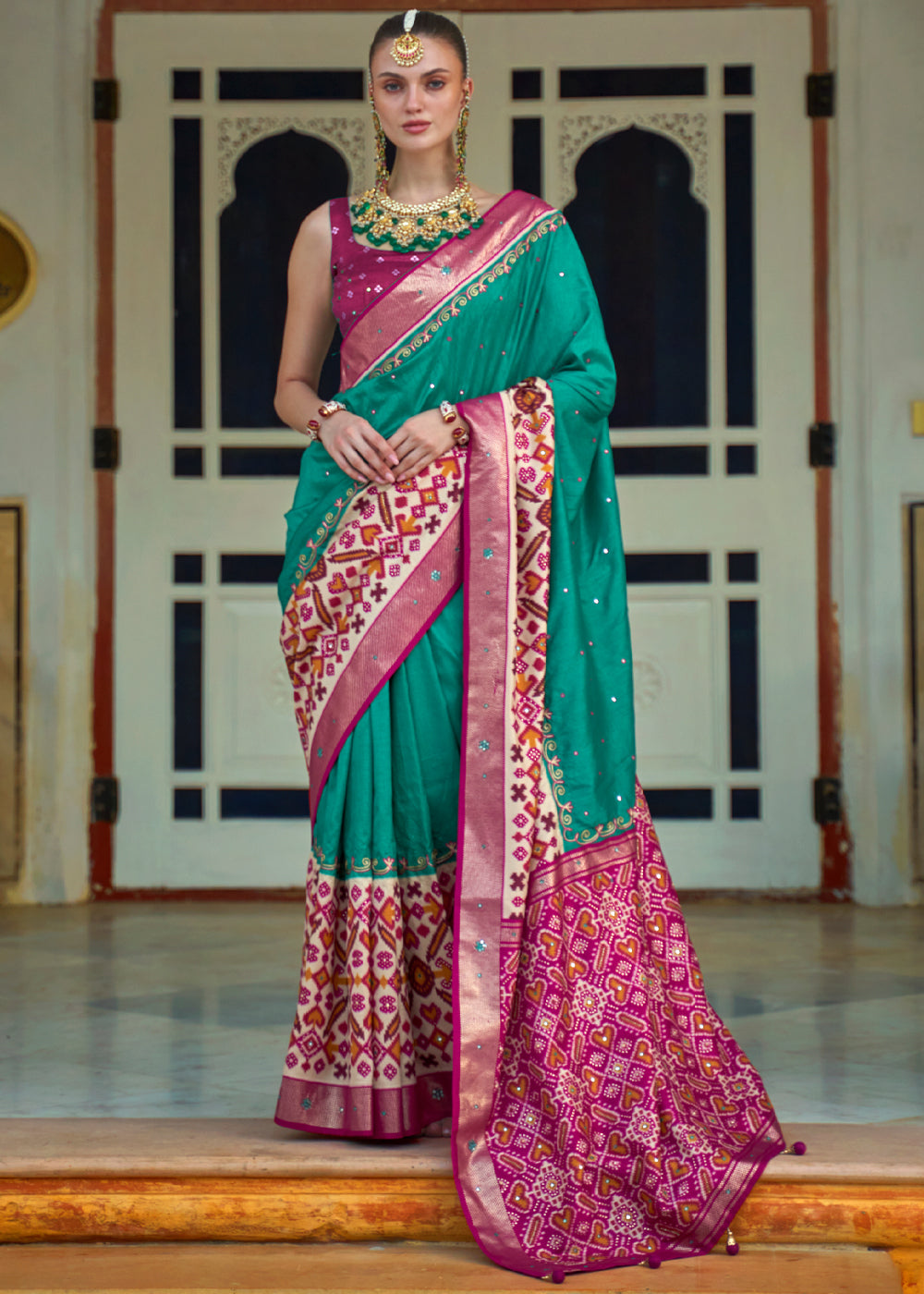 Pine Green and Pink Woven Patola Silk Saree