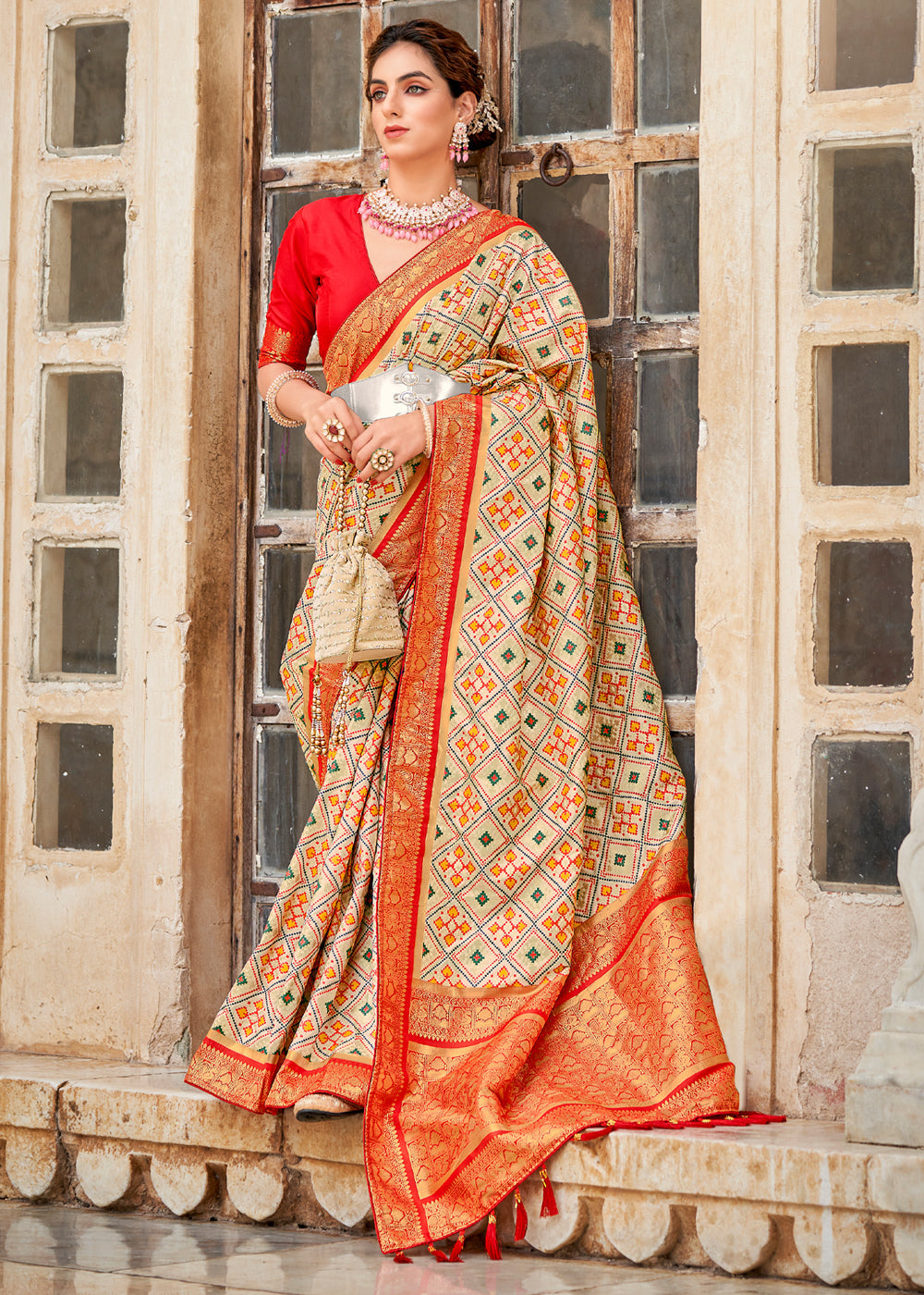 Apricot Cream and Red Zari Woven Patola Saree