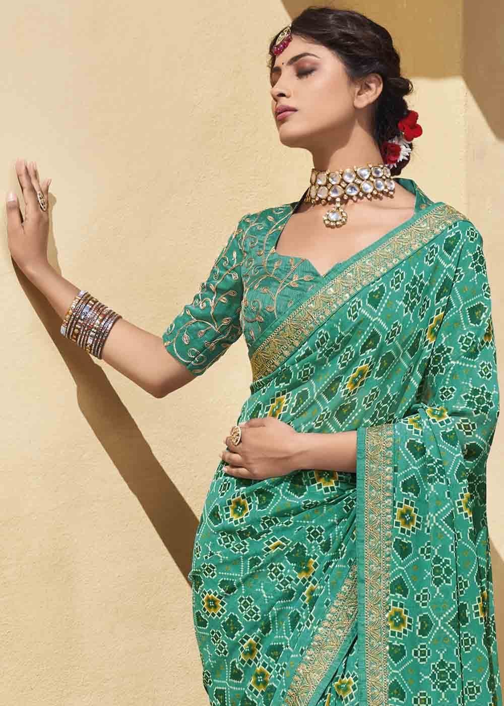 Jet Stream Green Patola Print Georgette Saree With Embroidered Blouse