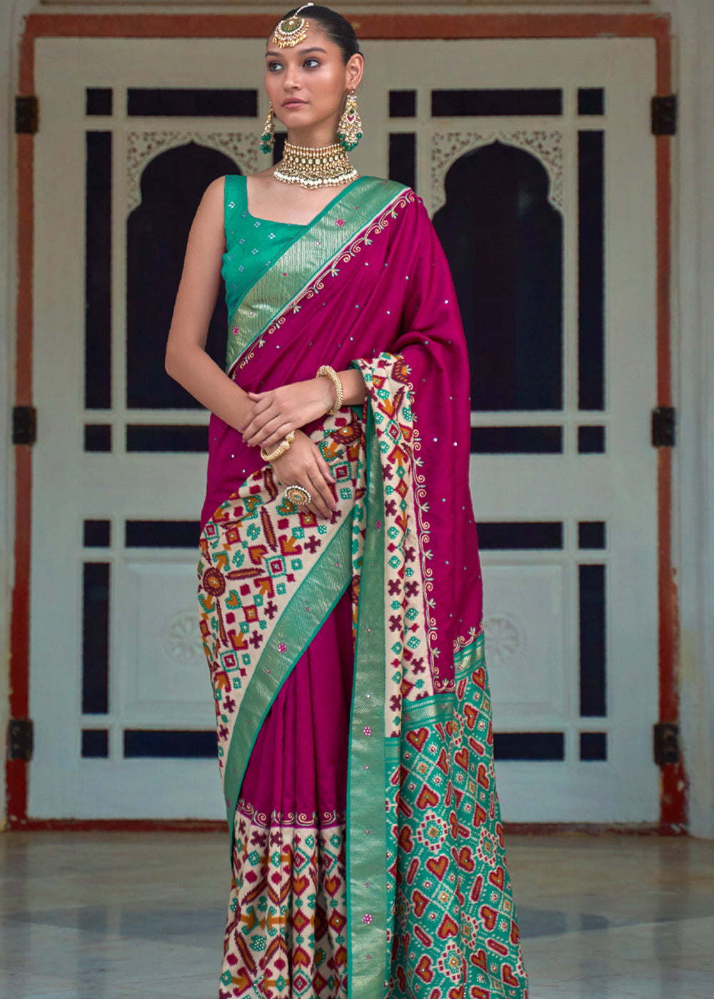 Camelot Dark Pink and Green Woven Patola Silk Saree