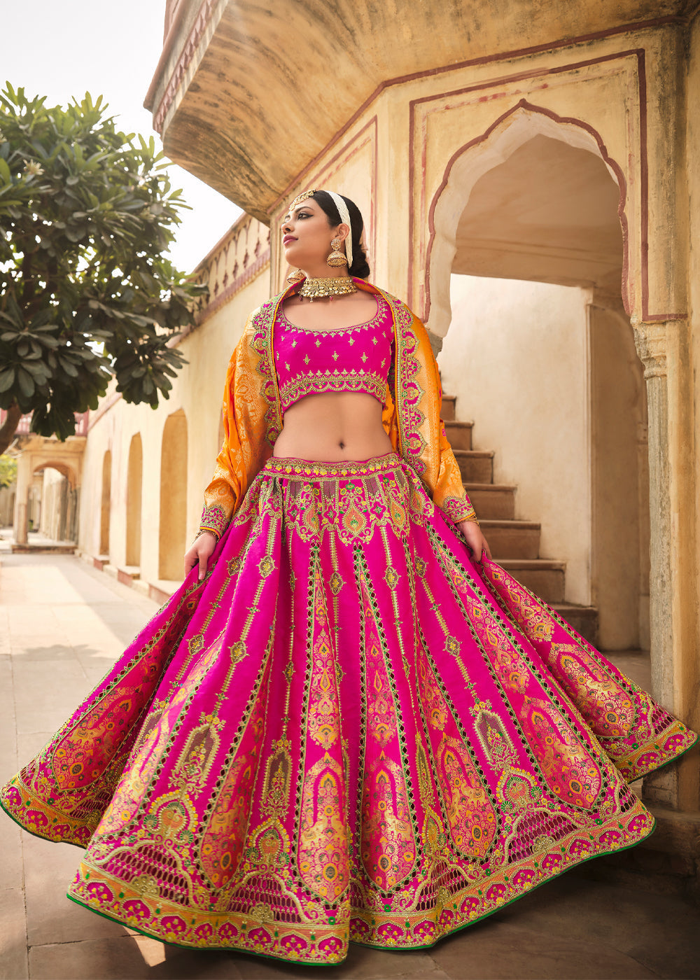 Cranberry Pink and Orange Heavy Embroidered Lehenga