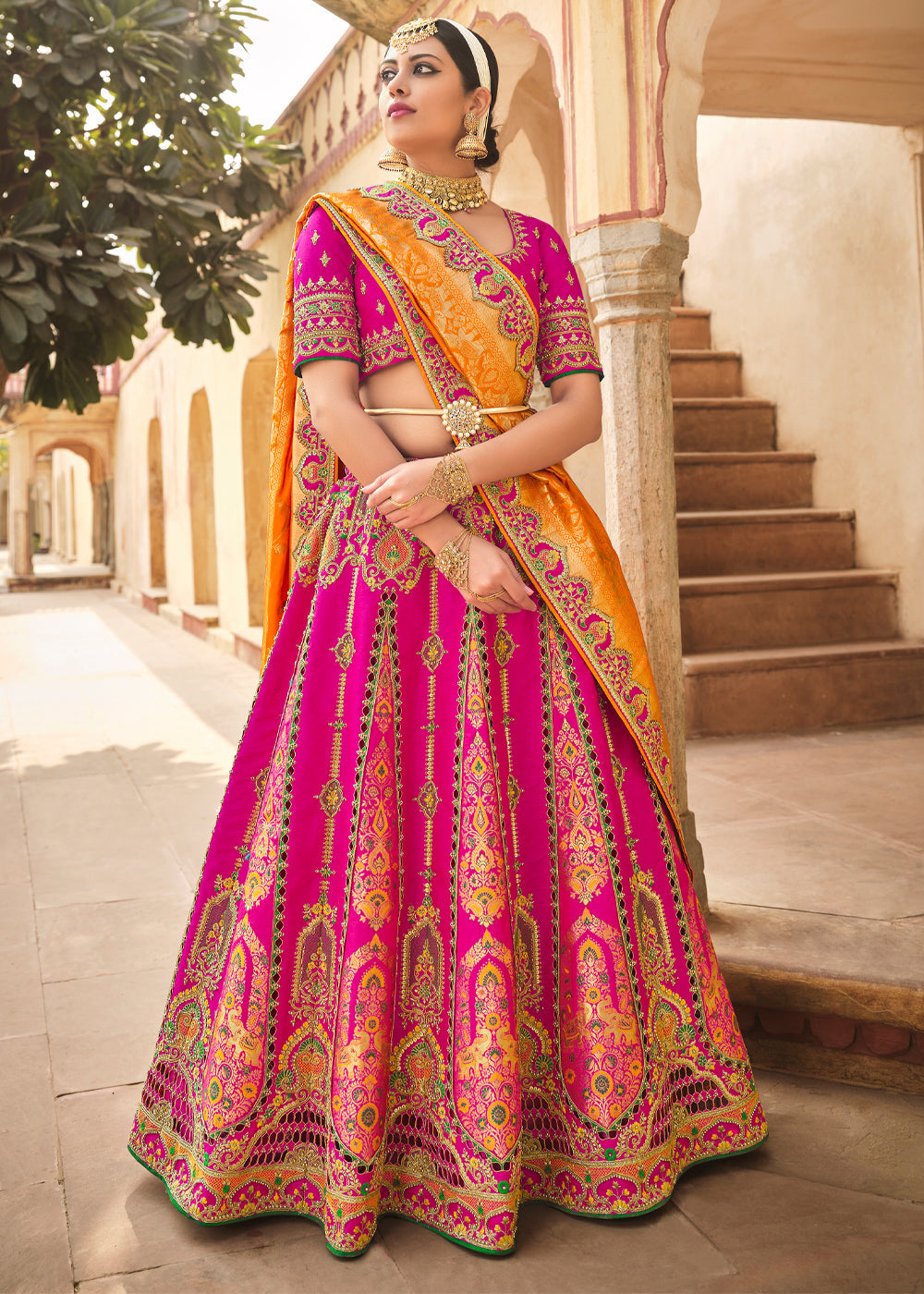 Cranberry Pink and Orange Heavy Embroidered Lehenga