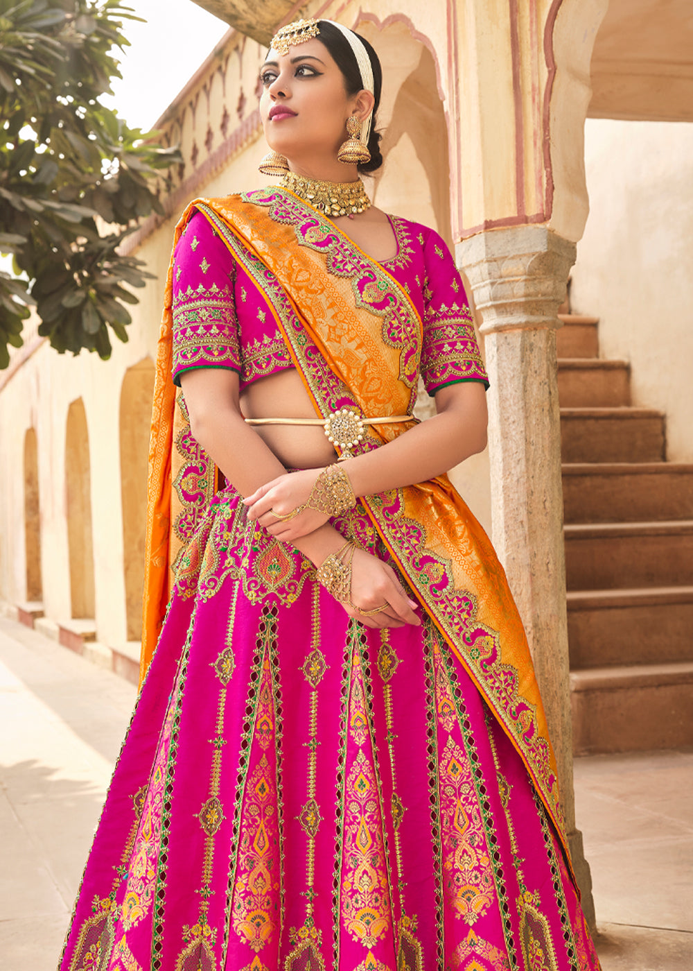 Cranberry Pink and Orange Heavy Embroidered Lehenga