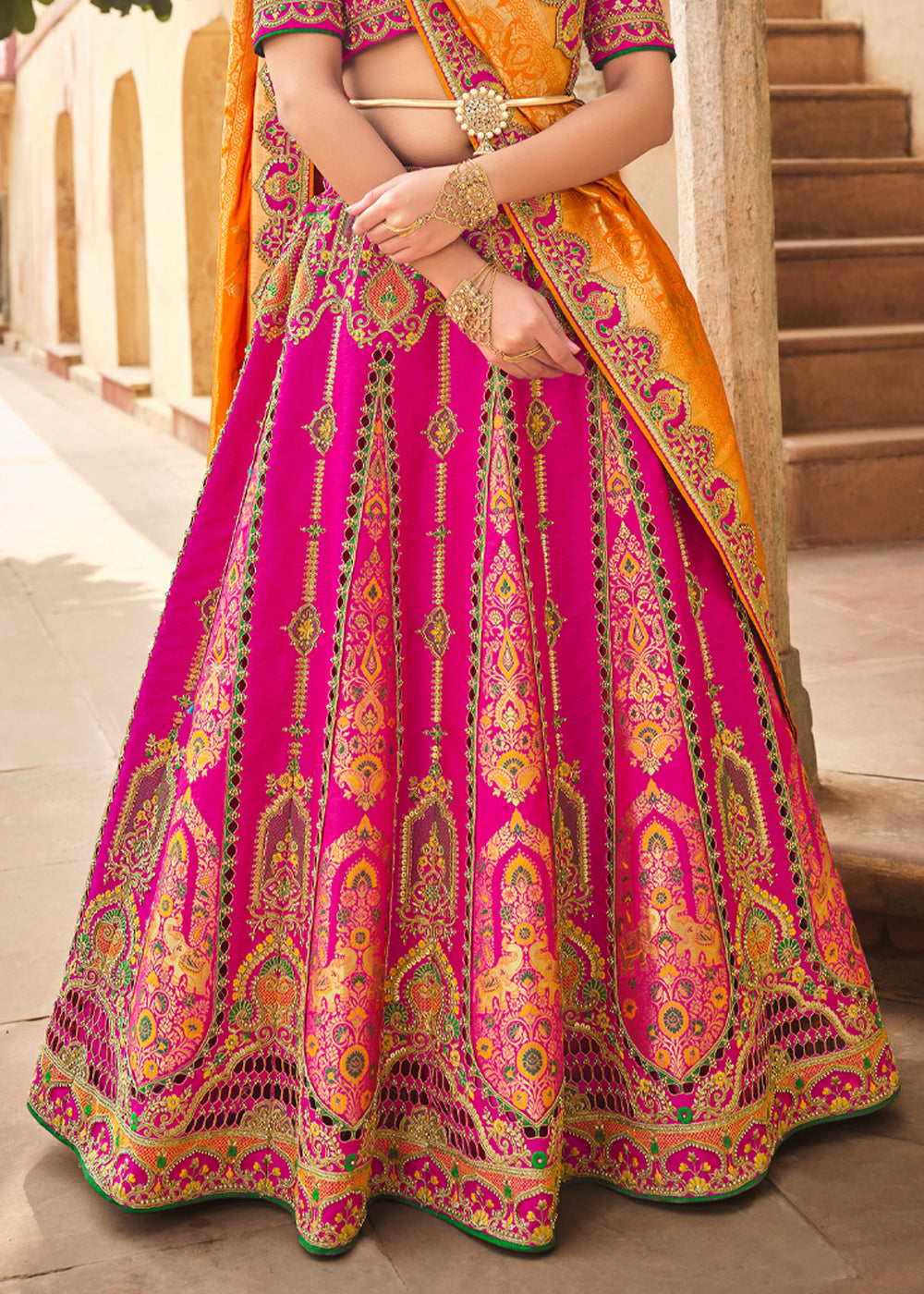 Cranberry Pink and Orange Heavy Embroidered Lehenga